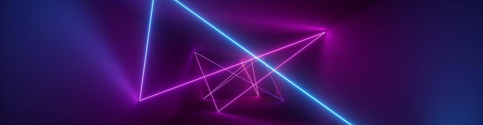 A neon purple laser casts a vibrant violet and magenta light across the room.